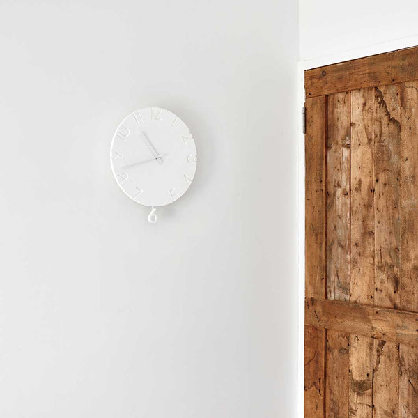 Naoki Terada Carved Swing Wall Clock White