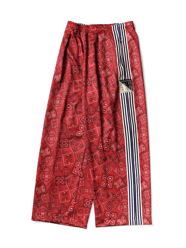 Kapital smooth jersey baggy track pants in cookie bandana print
