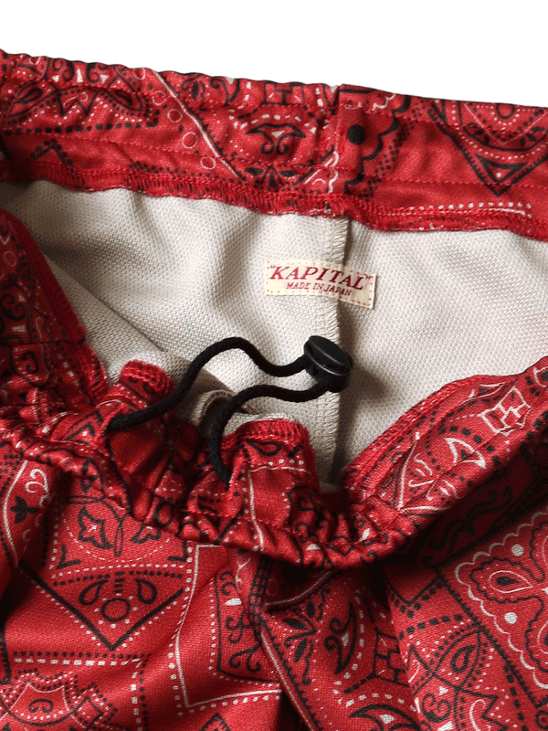 Kapital smooth jersey baggy track pants in cookie bandana print
