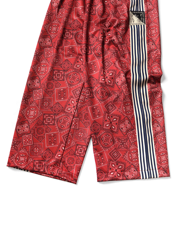 Kapital smooth jersey baggy track pants in cookie bandana print