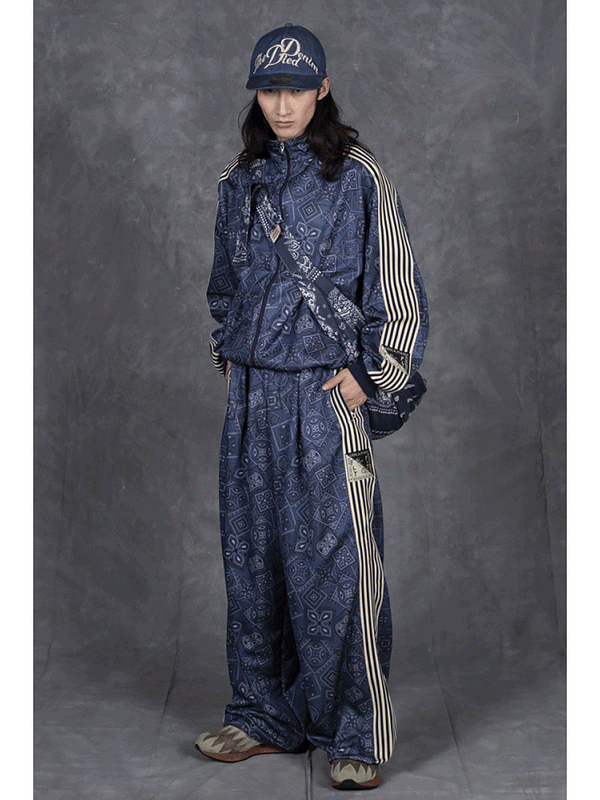 Kapital smooth jersey baggy track pants in cookie bandana print